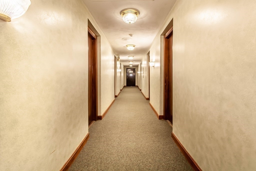 420 Great Road, Unit C2 Acton, MA 01720 - Photo 17 of 20 a view of a hallway with a hallway
