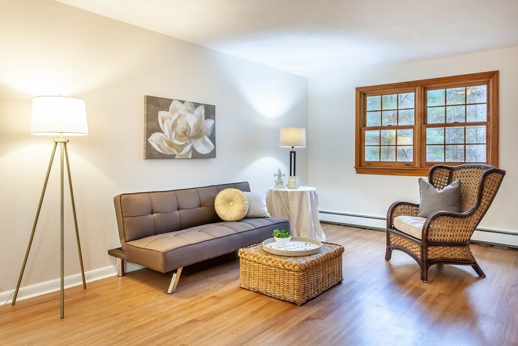 420 Great Road, Unit C2 Acton, MA 01720 - Photo 3 of 20 a living room with furniture and a table