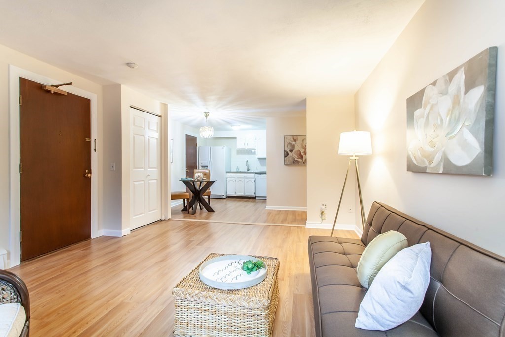 420 Great Road, Unit C2 Acton, MA 01720 - Photo 5 of 20 a living room with furniture and a table