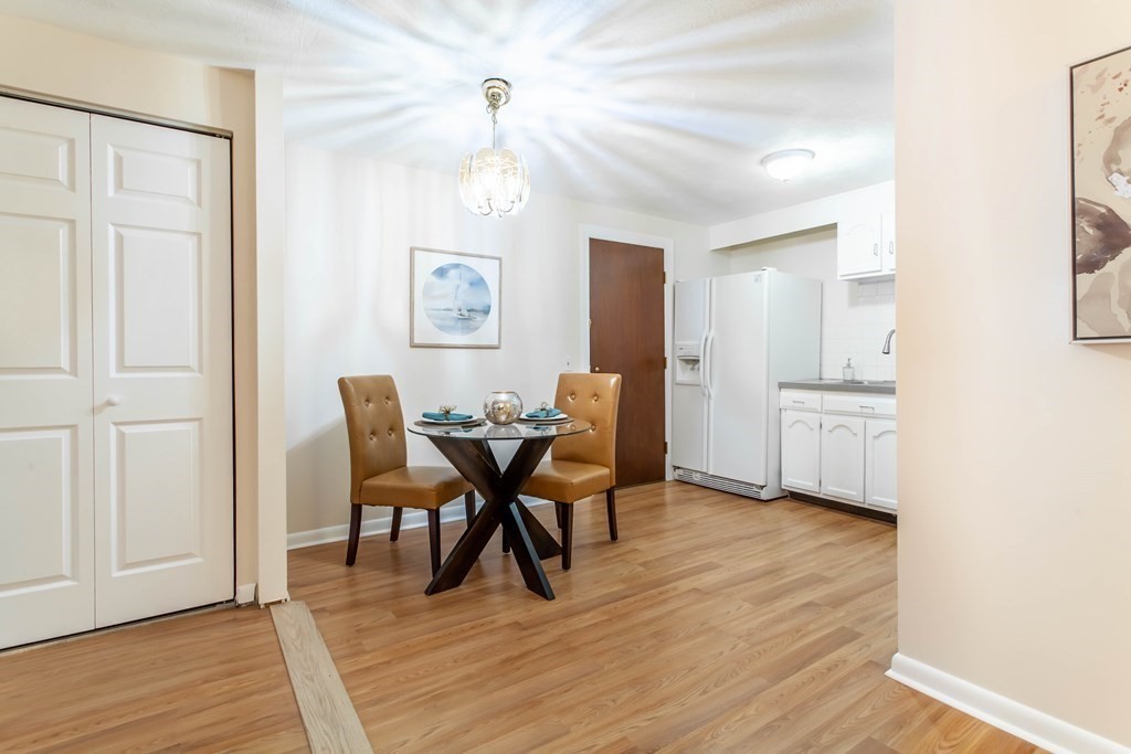 420 Great Road, Unit C2 Acton, MA 01720 - Photo 7 of 20 a view of a dining room with furniture and wooden floor