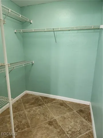 a bathroom with a sink a toilet and a shower