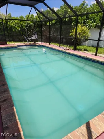 a view of yard with porch and entertaining space