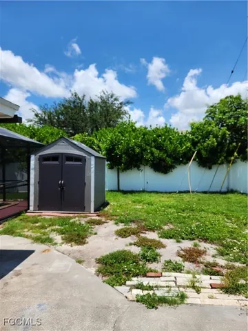 a bedroom with a bed and a cabinets