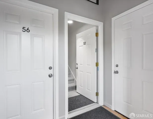 a view of a bathroom with a glass shower door