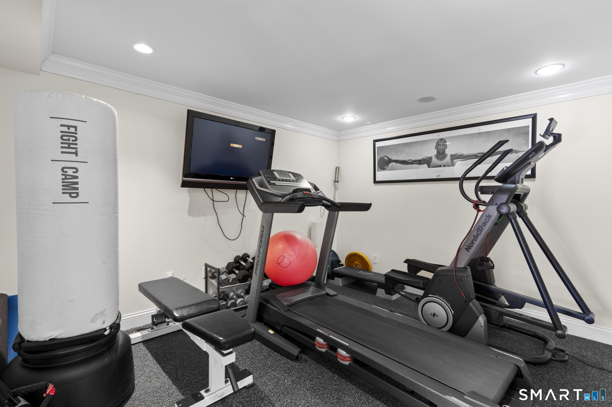 23 Country Lane Bethany, CT 06524 - Photo 25 of 31 Exercise room on the lower level