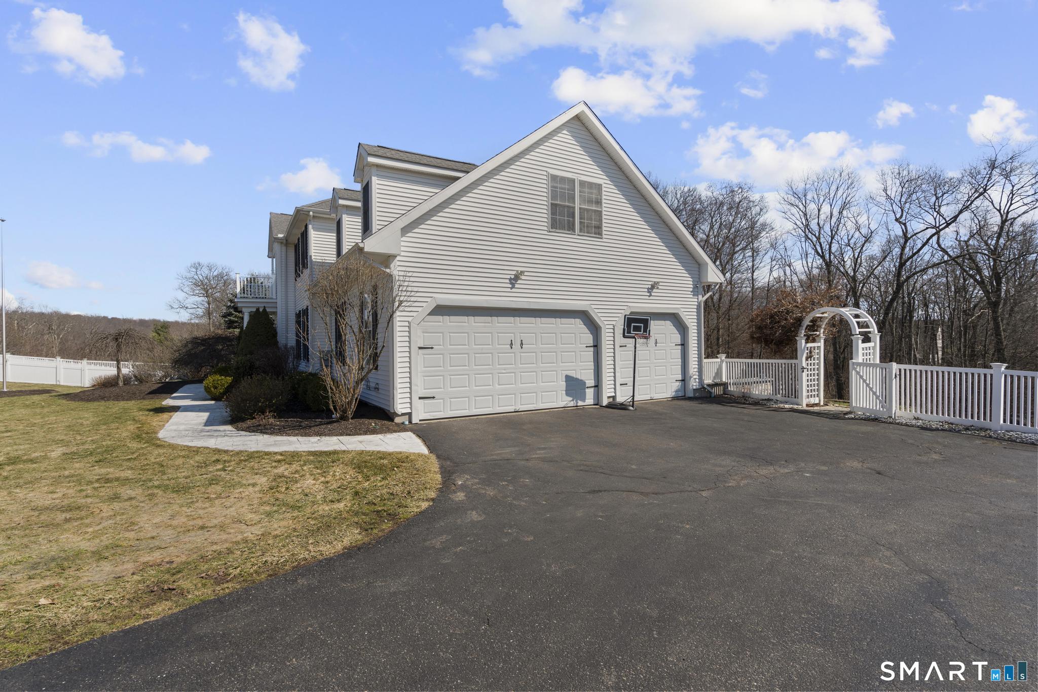 23 Country Lane Bethany, CT 06524 - Photo 28 of 31 two car garage