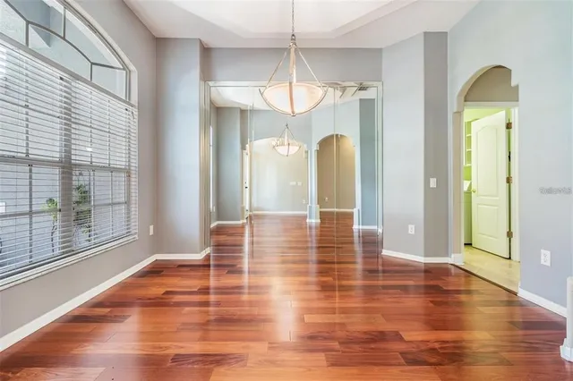 a kitchen with a sink stove and refrigerator