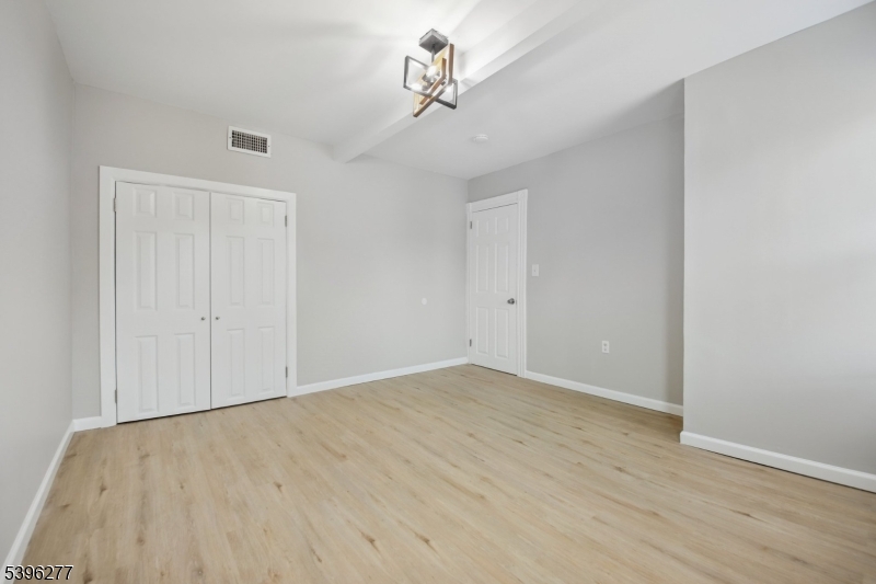 176 Valley Street, Unit 2 South Orange, NJ 07079 - Photo 15 of 30 wooden floor in an empty room