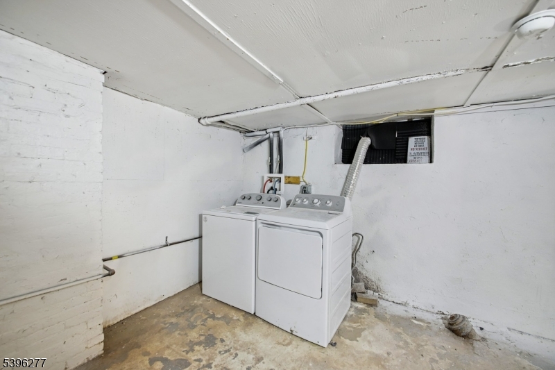 176 Valley Street, Unit 2 South Orange, NJ 07079 - Photo 28 of 30 a bathroom with a sink and a mirror