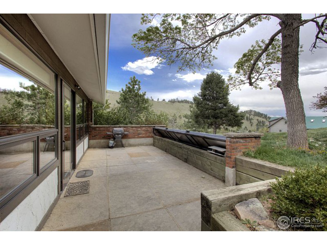 5725 Olde Stage Road Boulder, CO 80302 - Photo 19 of 25 a view of balcony with two chairs and a table