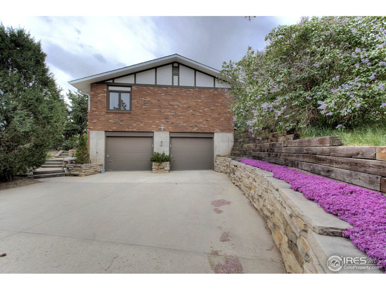 5725 Olde Stage Road Boulder, CO 80302 - Photo 21 of 25 a front view of a house with a yard