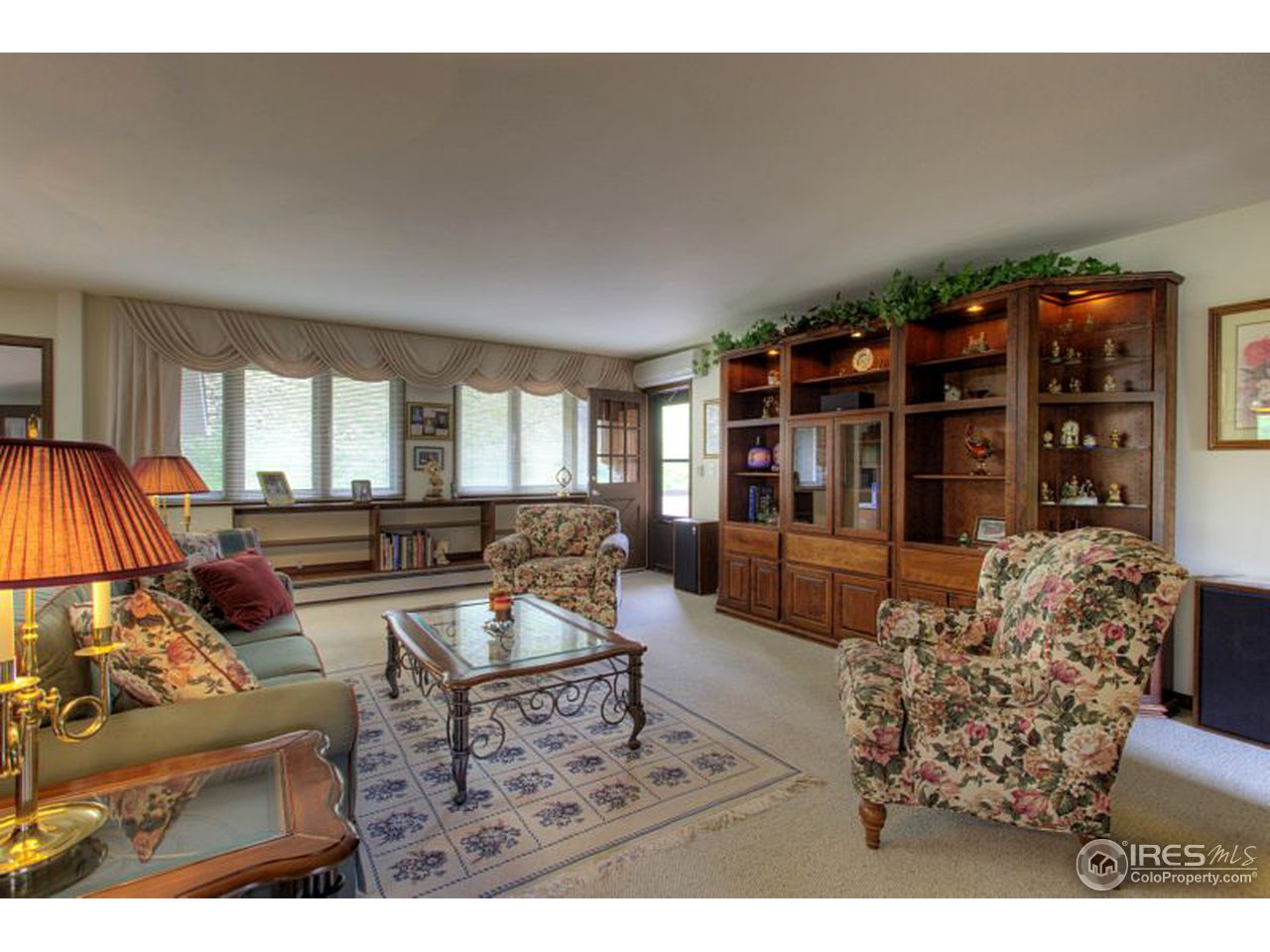 5725 Olde Stage Road Boulder, CO 80302 - Photo 9 of 25 a living room with furniture and a large window