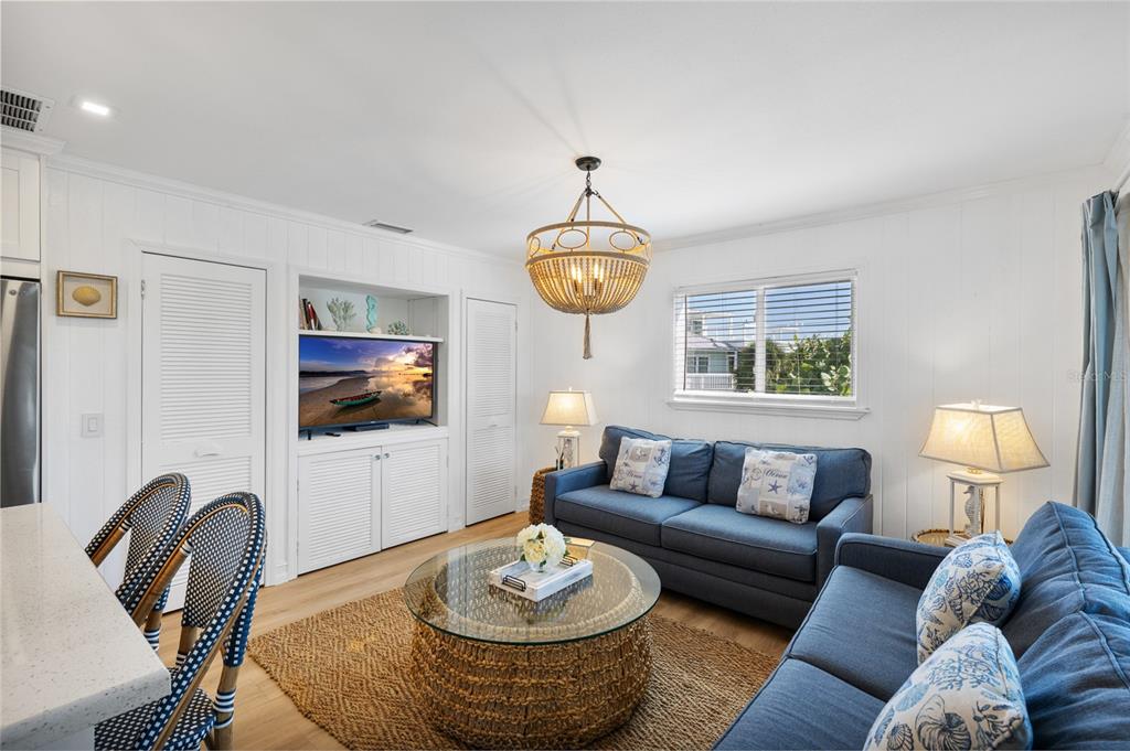 9368 Little Gasparilla Placida, FL 33946 - Photo 21 of 51 a living room with furniture a window and a flat screen tv