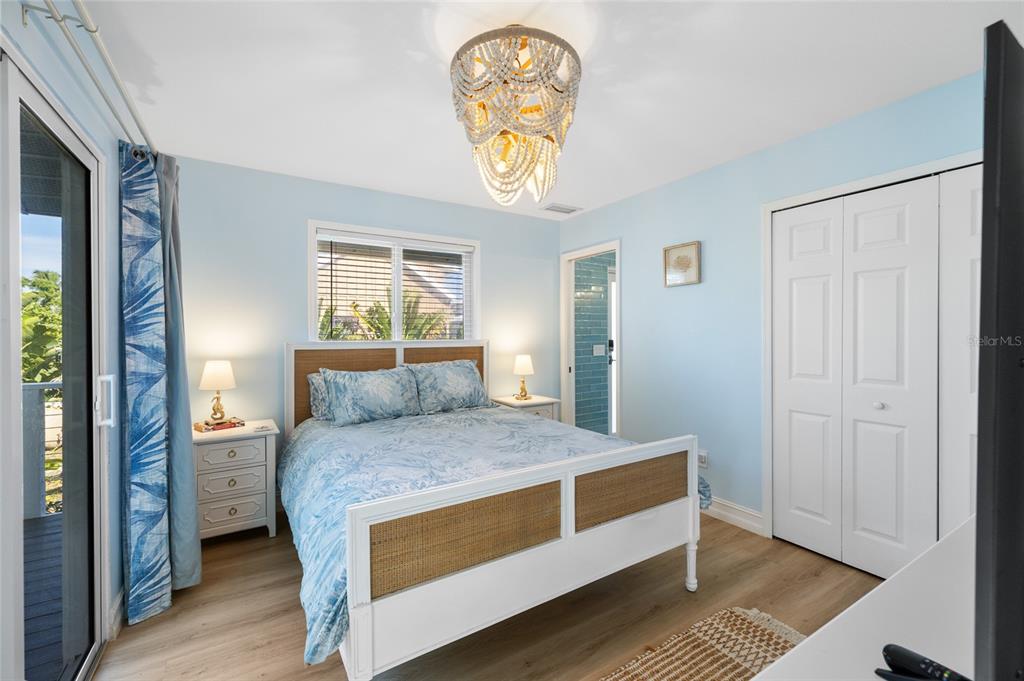 9368 Little Gasparilla Placida, FL 33946 - Photo 23 of 51 a bedroom with a bed and a window