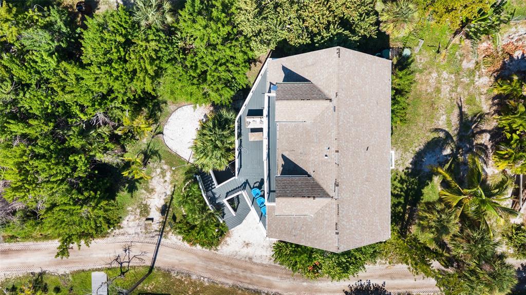 9368 Little Gasparilla Placida, FL 33946 - Photo 41 of 51 an aerial view of a house with a yard and garden
