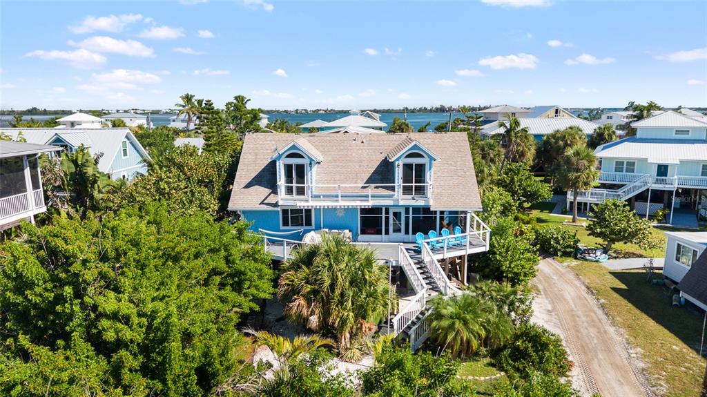 9368 Little Gasparilla Placida, FL 33946 - Photo 42 of 51 a view of a city with tall buildings