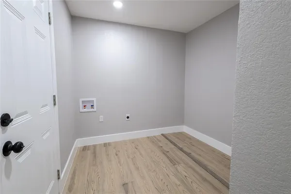 a view of small space with wooden floor