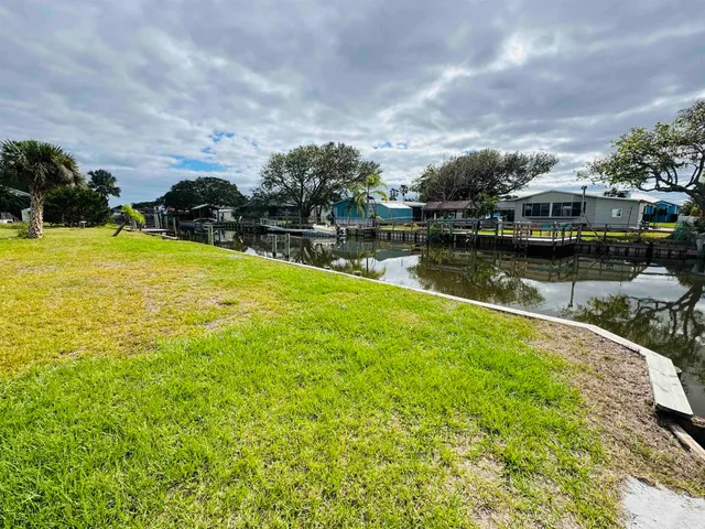 a view of a lake with a house
