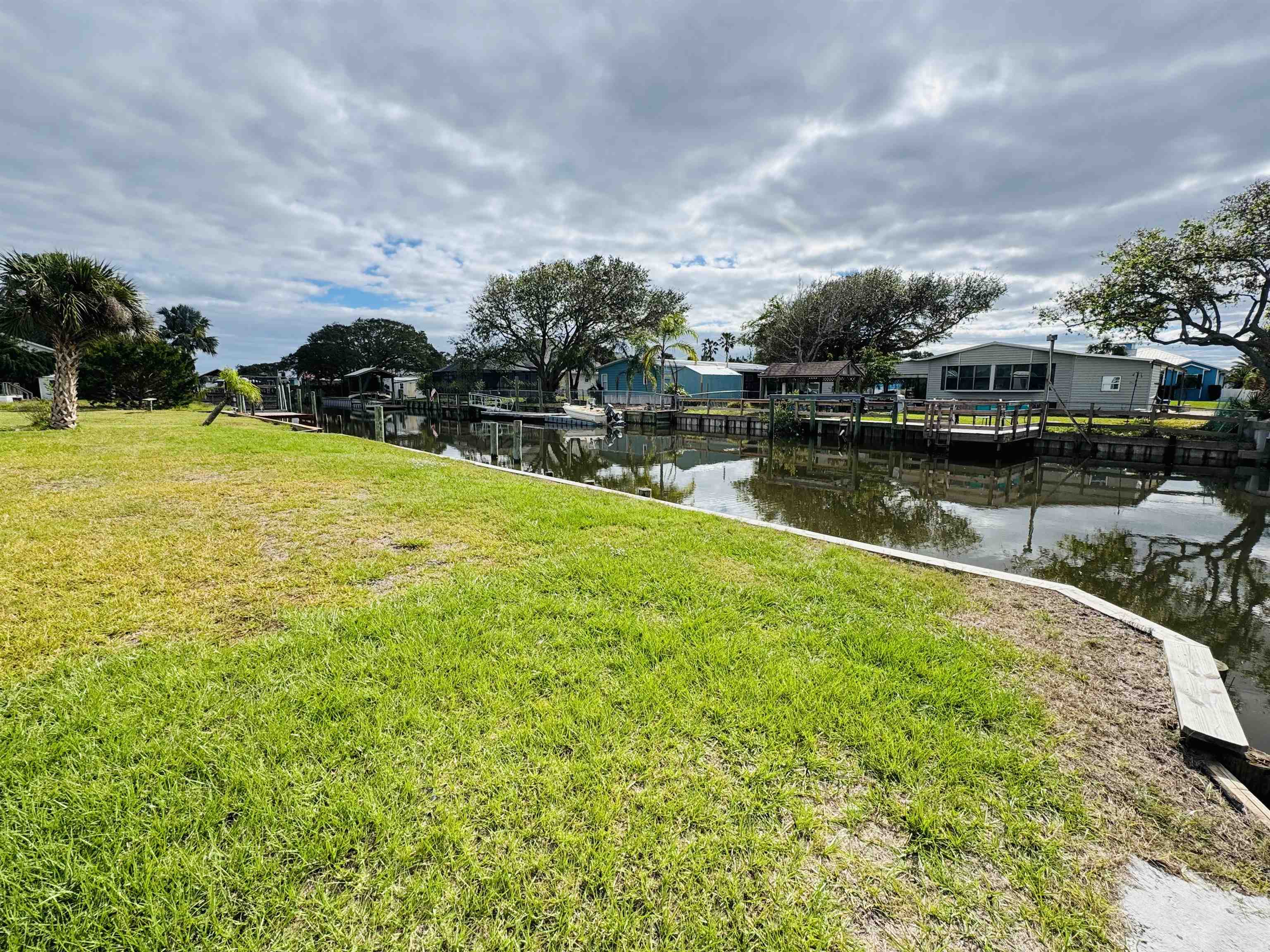 267 Basque Road St. Augustine, FL 32080 - Photo 8 of 20 a view of a lake with a house