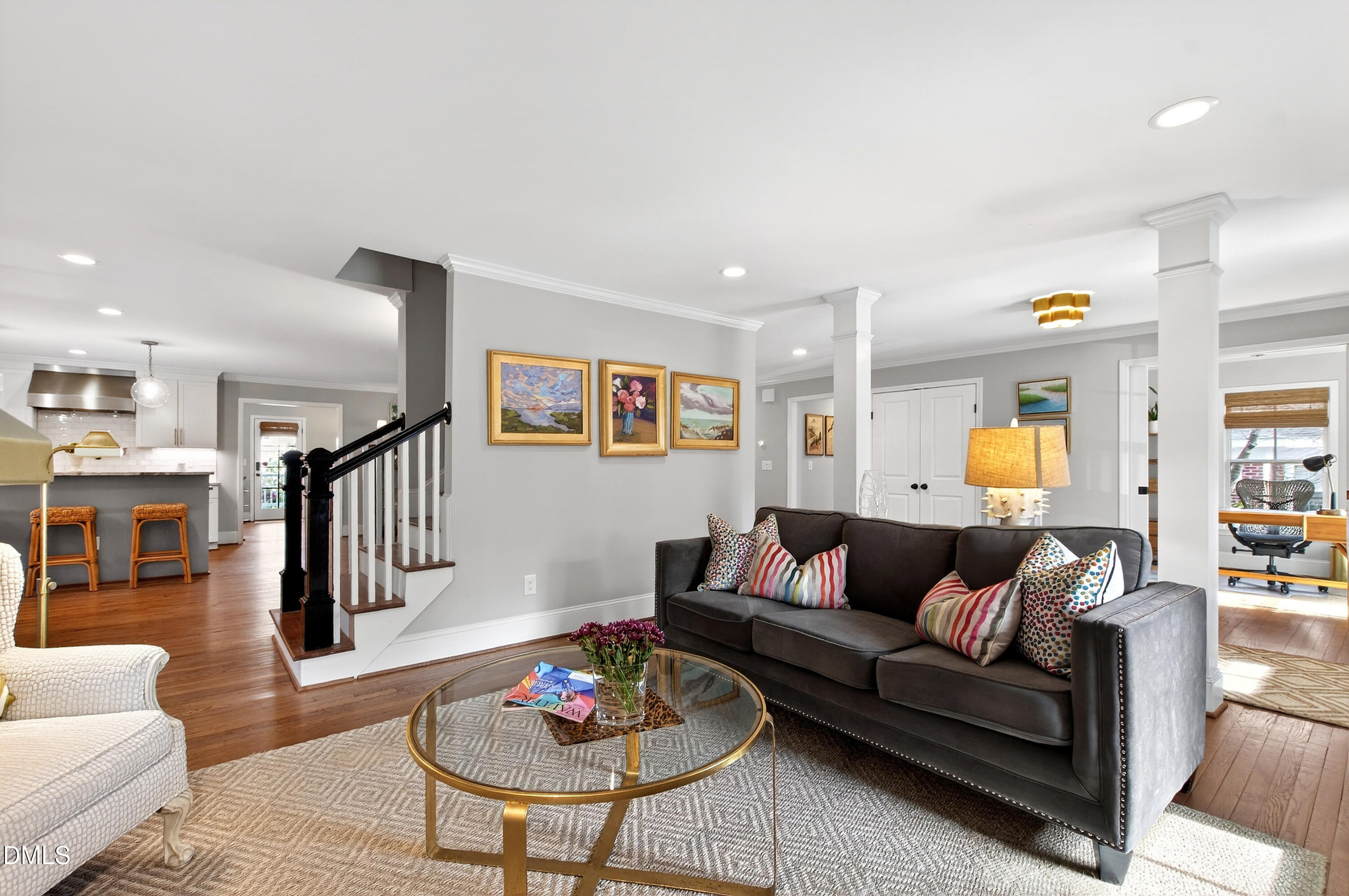 2622 Wells Avenue Raleigh, NC 27608 - Photo 16 of 65 a living room with furniture and a dining table with wooden floor