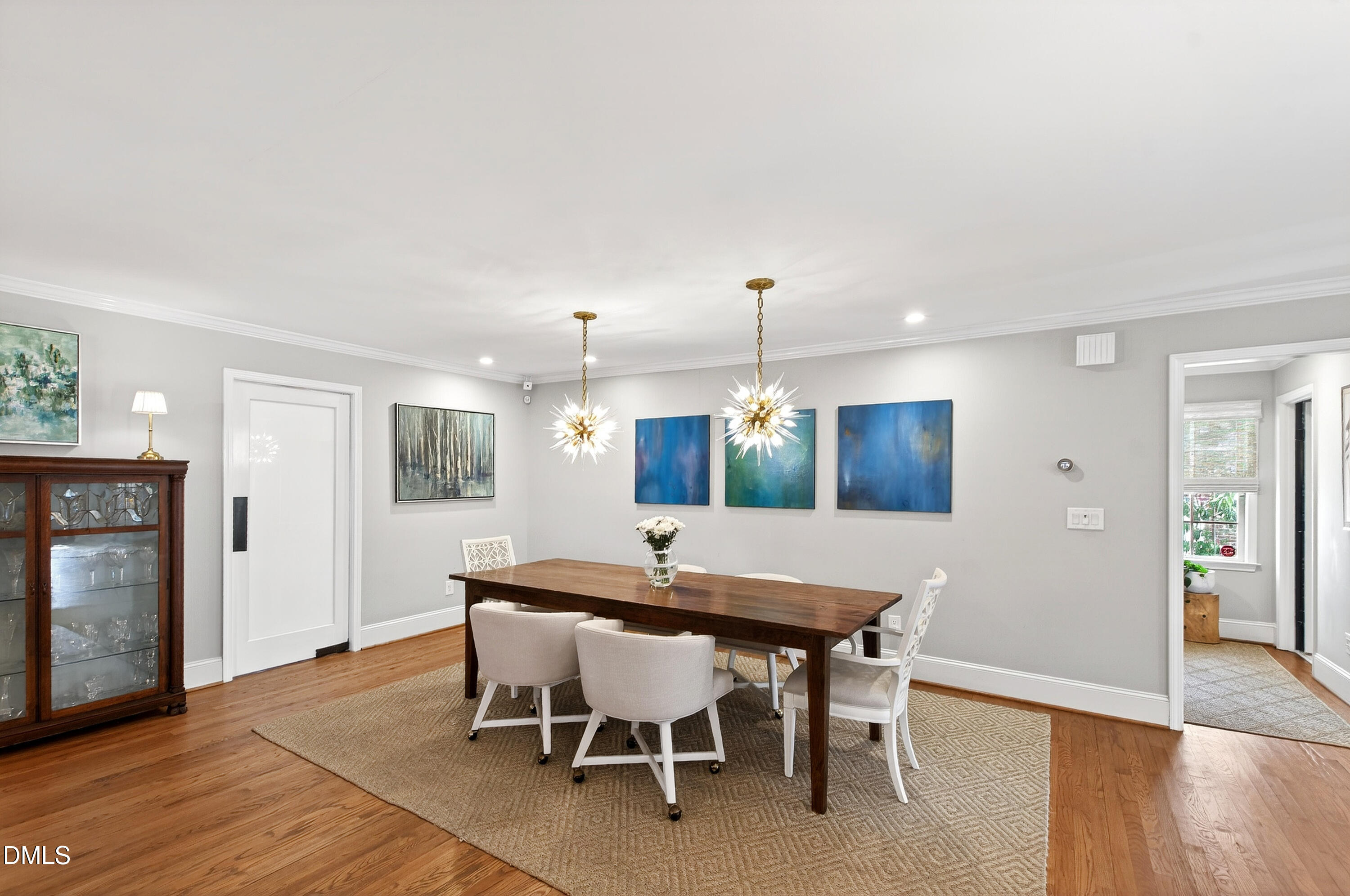 2622 Wells Avenue Raleigh, NC 27608 - Photo 20 of 65 a dining room with furniture and wooden floor