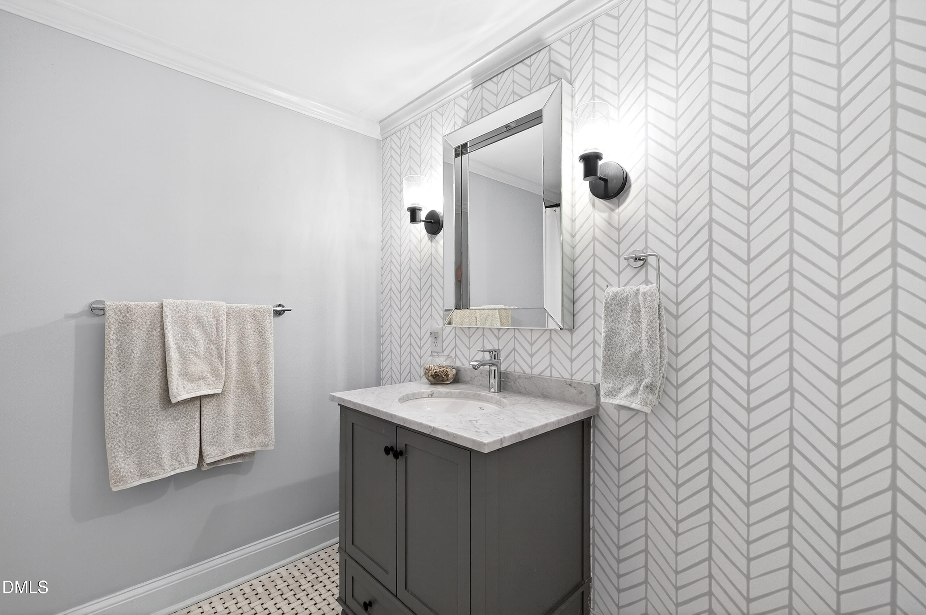 2622 Wells Avenue Raleigh, NC 27608 - Photo 46 of 65 a bathroom with a sink and a mirror