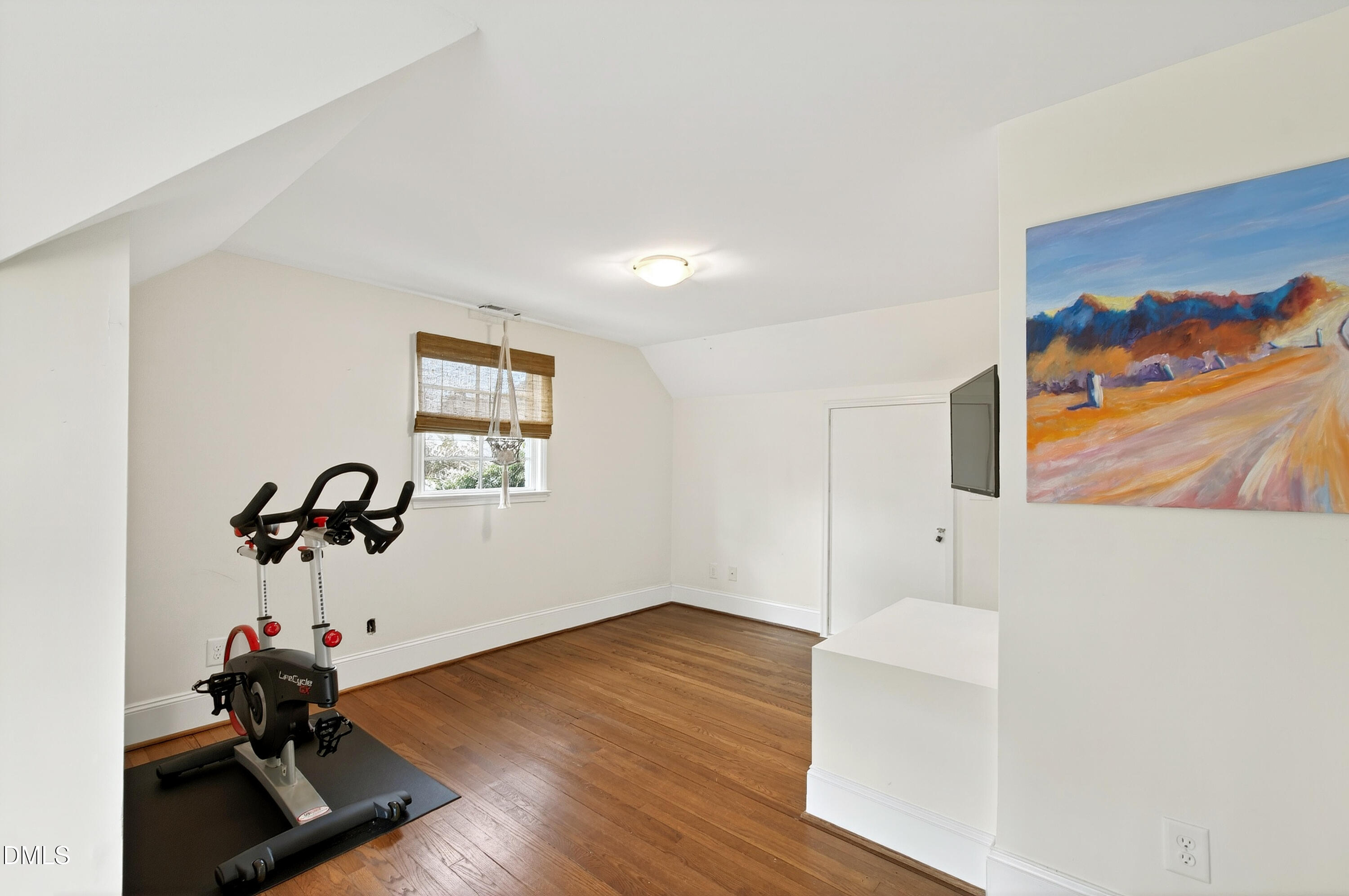 2622 Wells Avenue Raleigh, NC 27608 - Photo 50 of 65 a view of a room with wooden floor and window