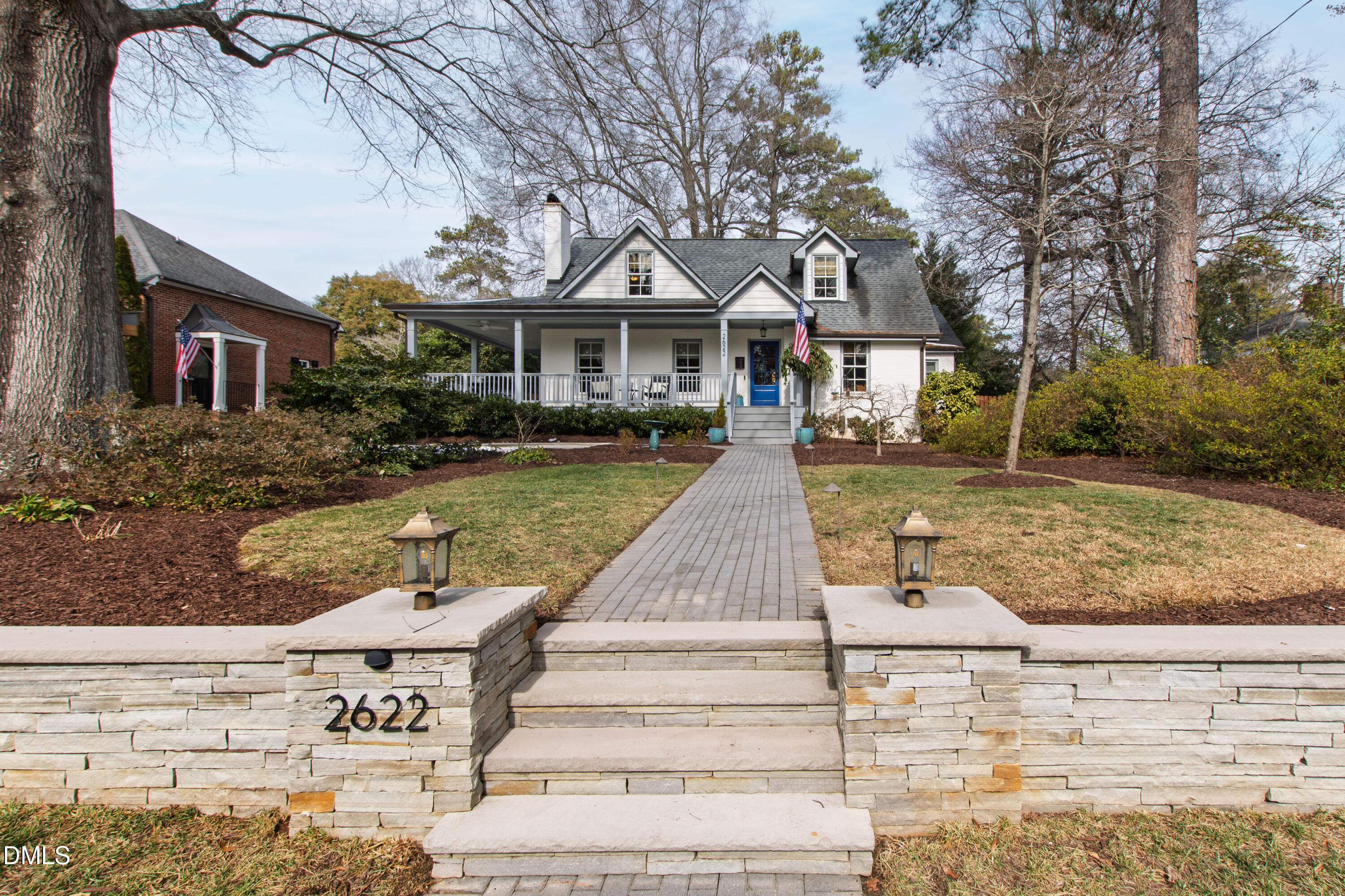 2622 Wells Avenue Raleigh, NC 27608 - Photo 4 of 65 a front view of a house with yard porch and seating area