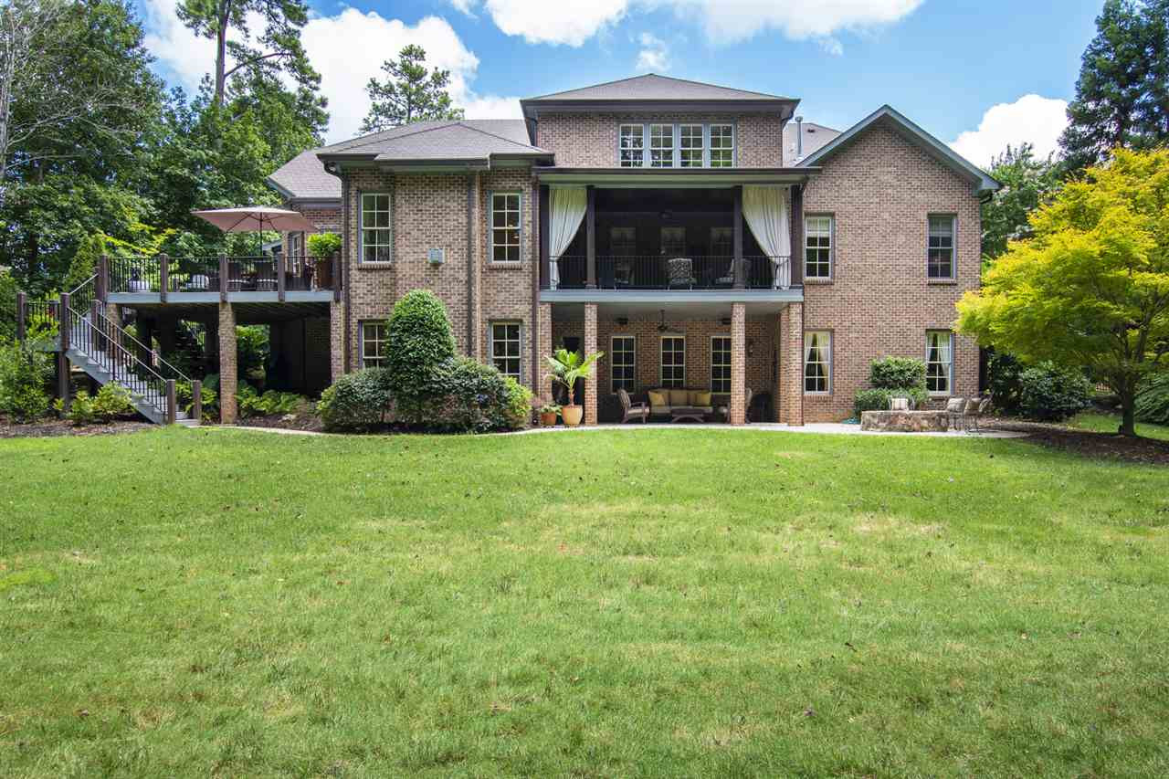 1512 Consett Court Raleigh, NC 27613 - Photo 29 of 30 Exterior back shows all of the outdoor living spaces home has to offer. Exterior back of home