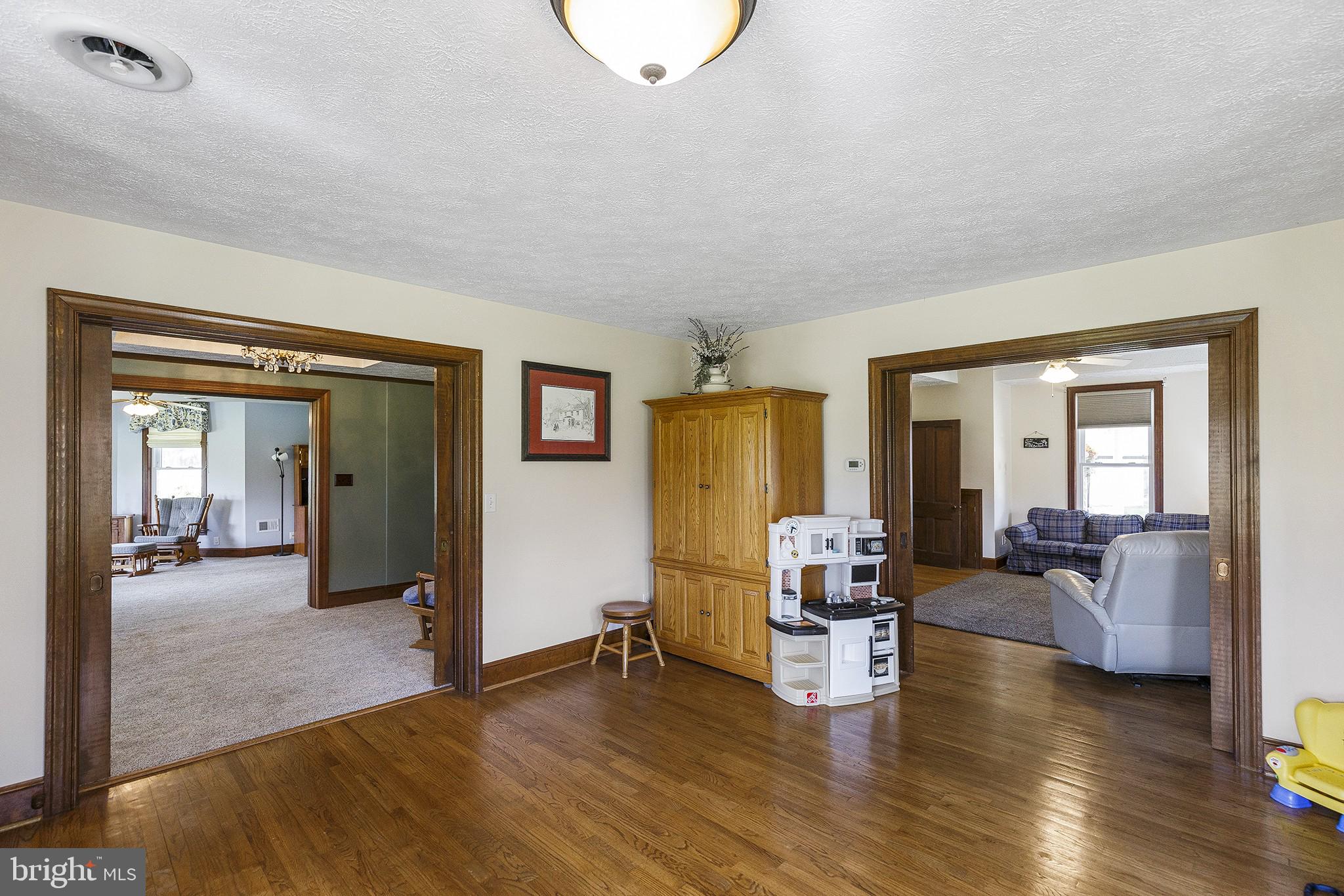 21400 Colton Point Road Avenue, MD 20609 - Photo 13 of 41 Sitting Room with view to foyer & family room.