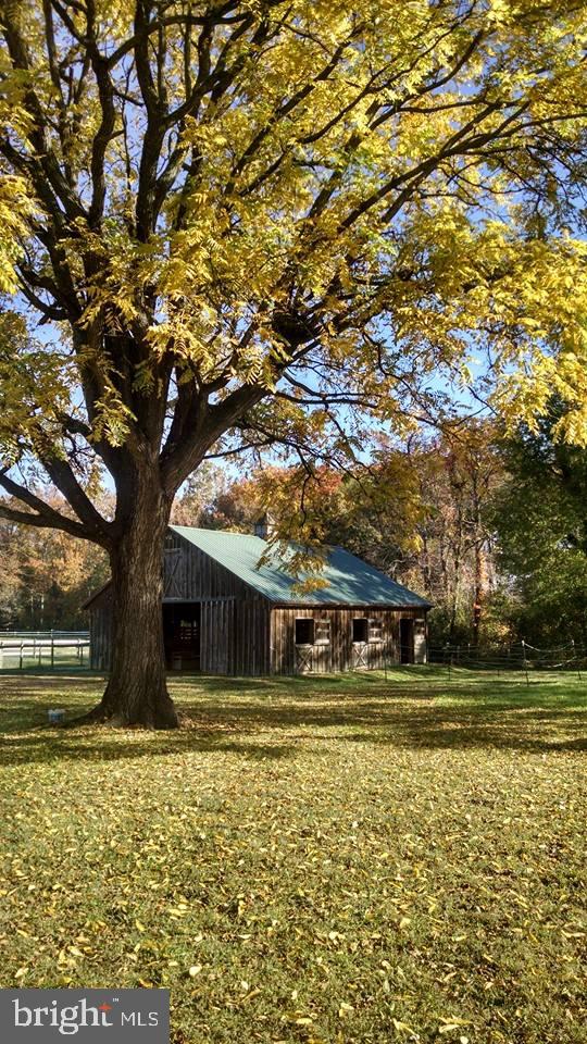 21400 Colton Point Road Avenue, MD 20609 - Photo 26 of 41 Backyard and barn
