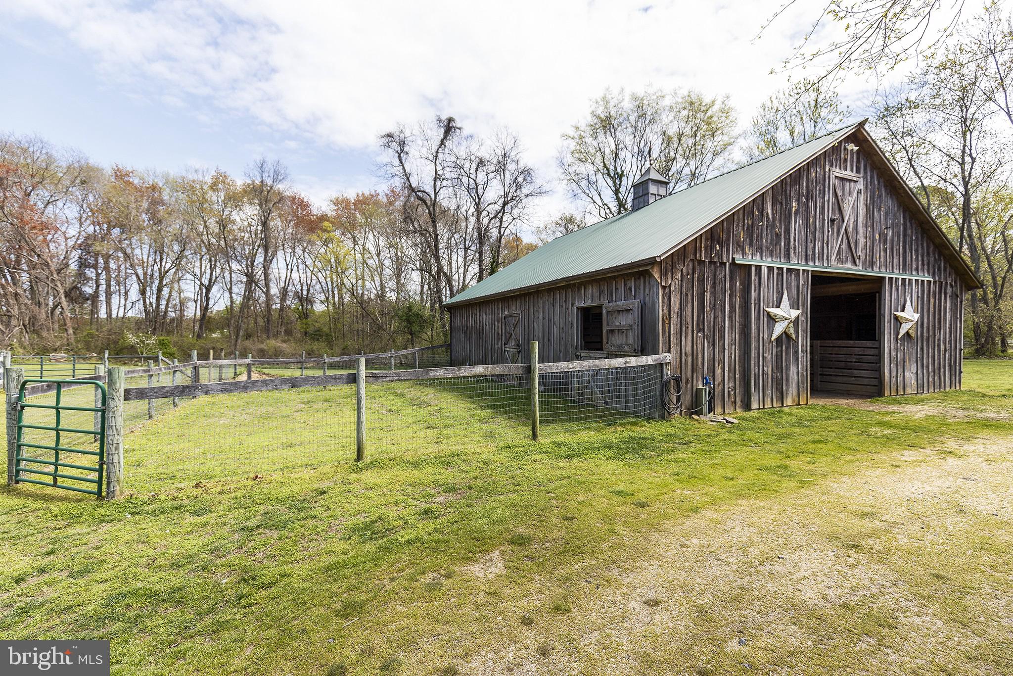 21400 Colton Point Road Avenue, MD 20609 - Photo 27 of 41 5-stall barn, dutch door, tack rm, & exterior pen