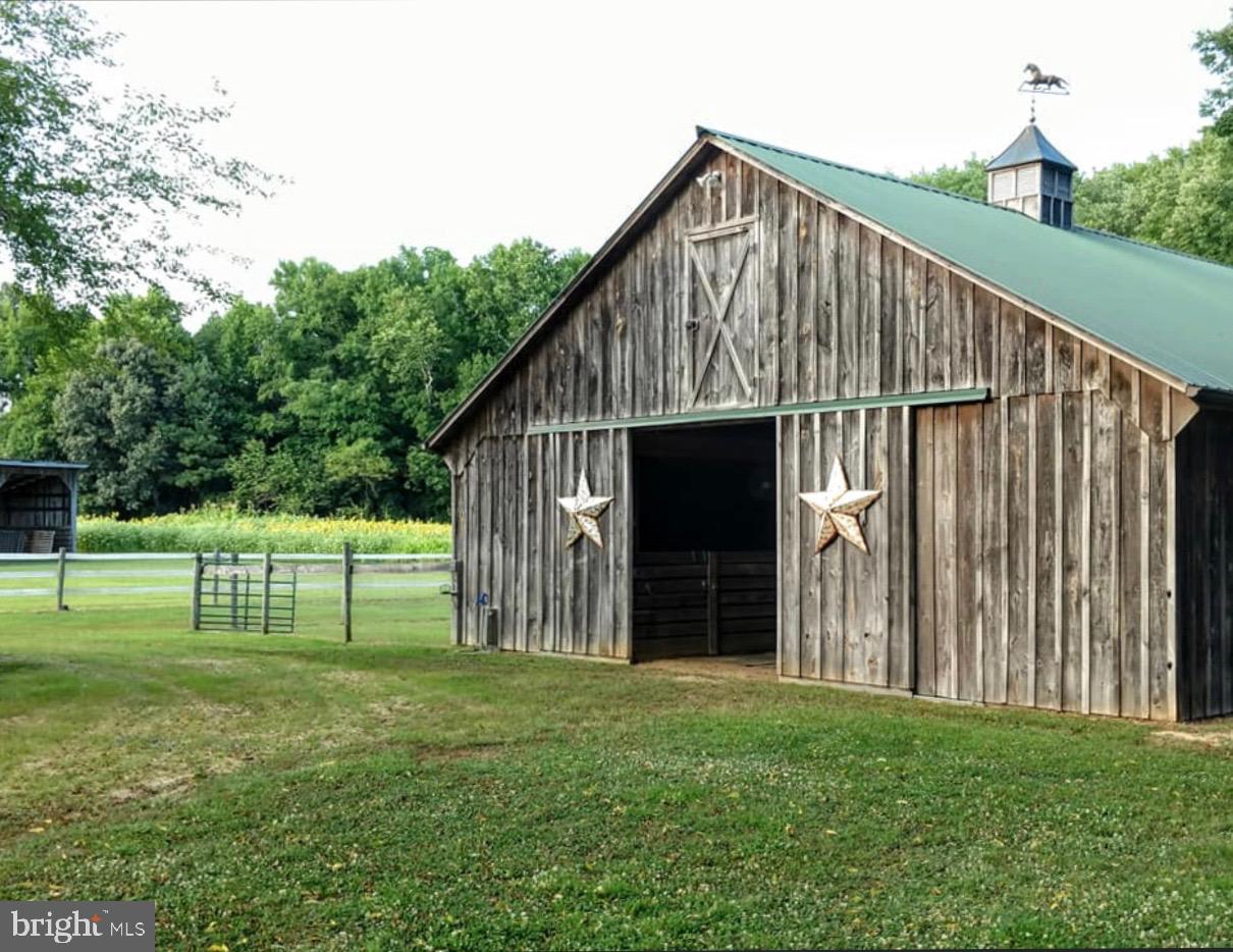21400 Colton Point Road Avenue, MD 20609 - Photo 28 of 41 5-stall barn, interior dutch door & exterior pen