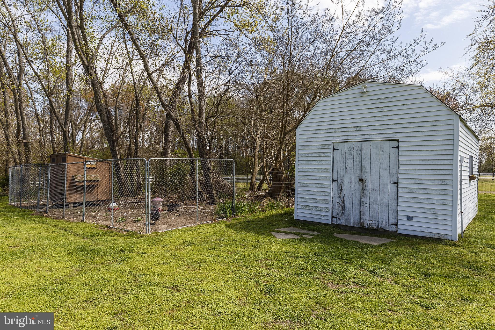 21400 Colton Point Road Avenue, MD 20609 - Photo 34 of 41 Chicken coop and storage shed