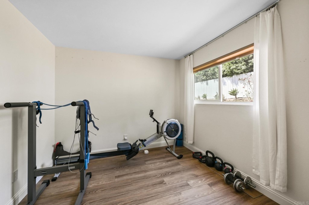 938 Doris Drive Encinitas, CA 92024 - Photo 19 of 31 a view of a room with gym equipment