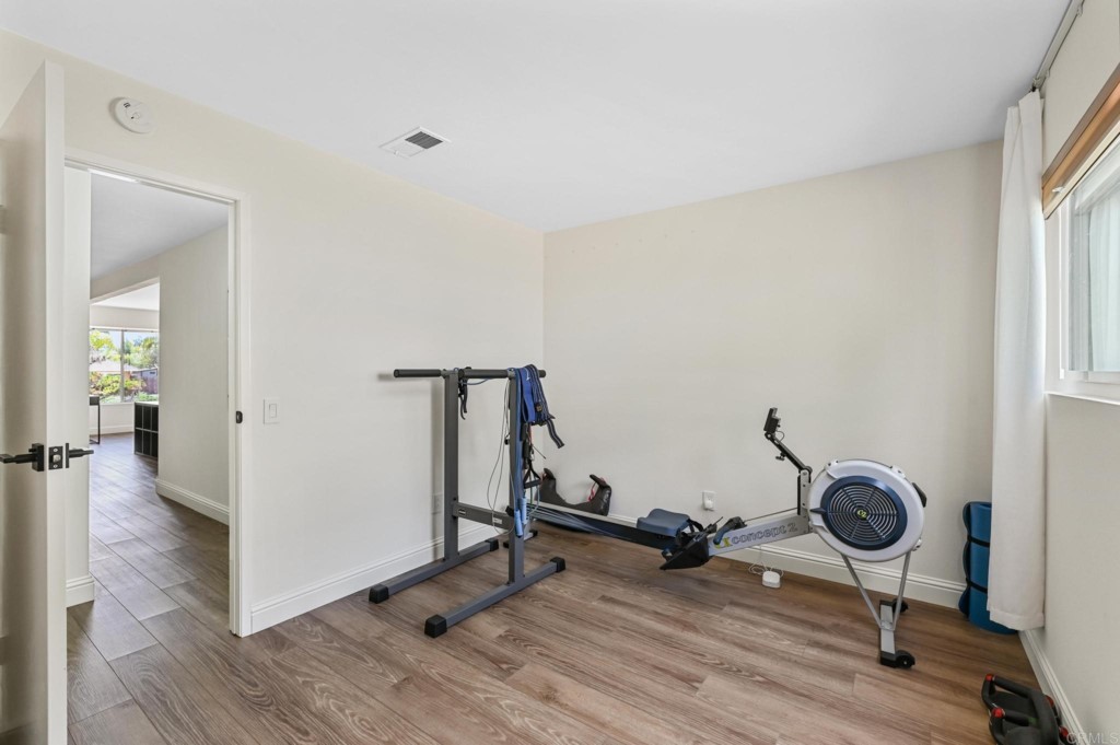 938 Doris Drive Encinitas, CA 92024 - Photo 20 of 31 a view of a room with gym equipment