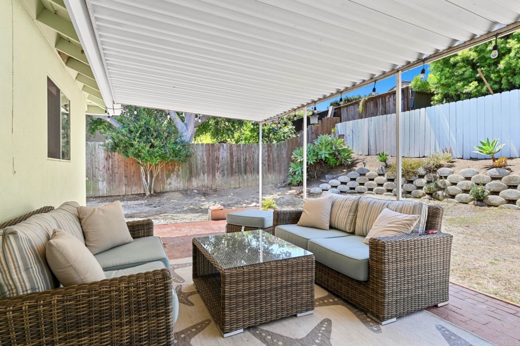 938 Doris Drive Encinitas, CA 92024 - Photo 22 of 31 a outdoor living space with patio furniture and wooden floor