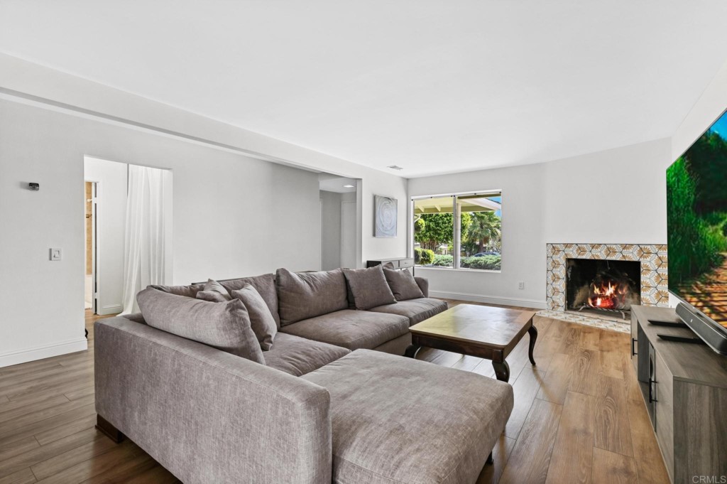 938 Doris Drive Encinitas, CA 92024 - Photo 4 of 31 a living room with furniture and a fireplace
