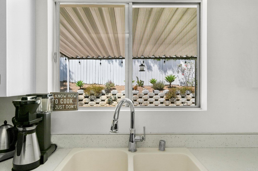 938 Doris Drive Encinitas, CA 92024 - Photo 9 of 31 a bathroom with a bathtub and a sink