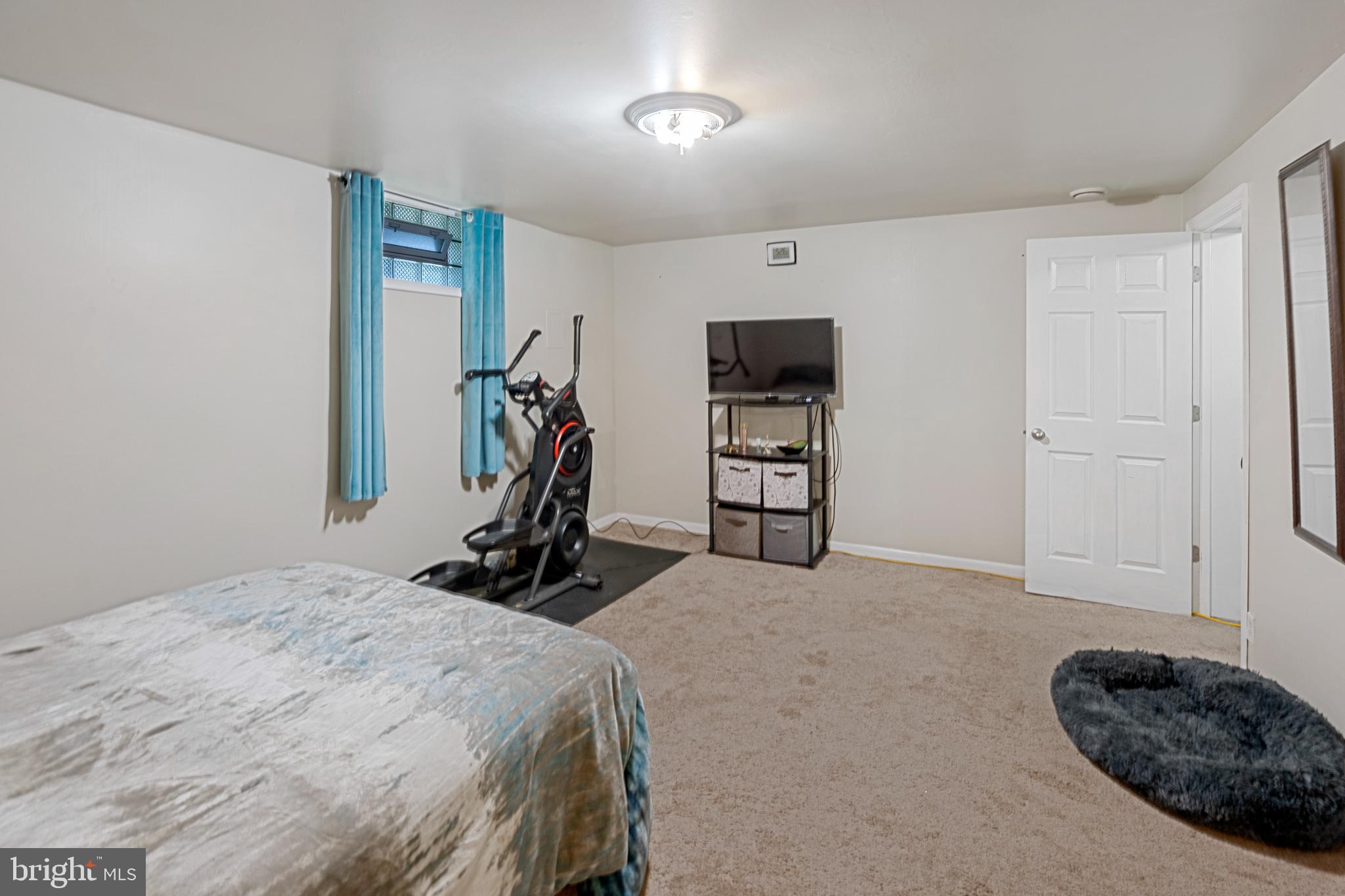 8254 Brattle Road Pikesville, MD 21208 - Photo 17 of 27 lower level bedroom