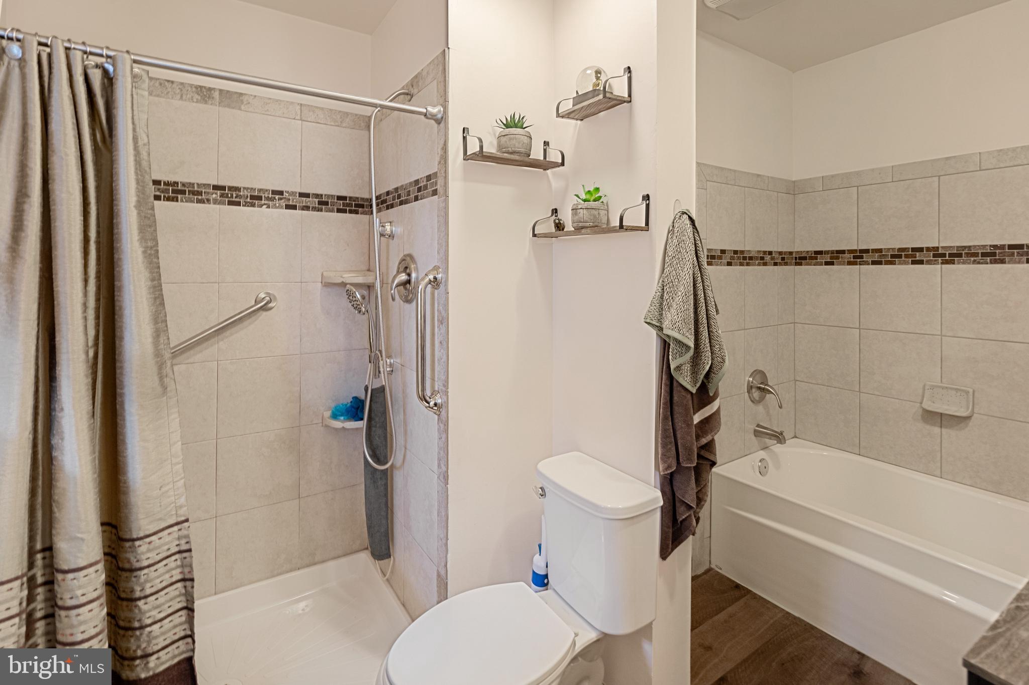 8254 Brattle Road Pikesville, MD 21208 - Photo 8 of 27 1st flr primary bedroom ensuite bathroom