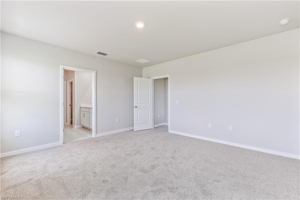 17770 Shade Tree Loop Punta Gorda, FL 33982 - Photo 11 of 47 a view of an empty room