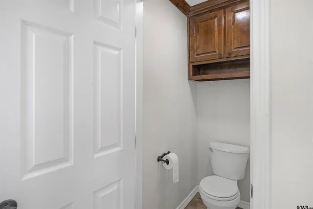a bathroom with a toilet