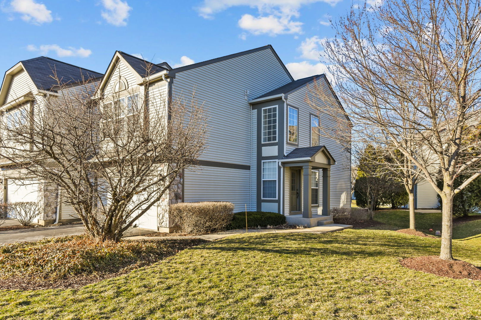 3142 Bromley Lane Aurora, IL 60502 - Photo 1 of 15 a front view of a house with a yard