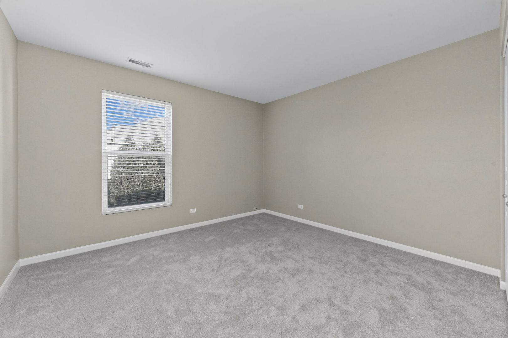 3142 Bromley Lane Aurora, IL 60502 - Photo 13 of 15 a view of an empty room with a window