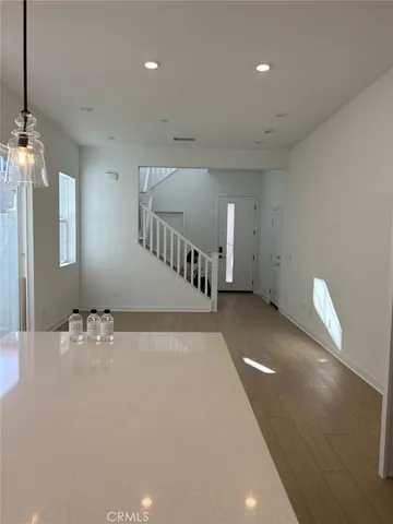 a view of a livingroom with a staircase