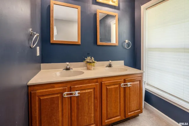 a white bath tub sitting in a bathroom