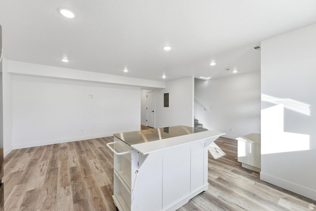 645 West 880th Street South Fillmore, UT 84631 - Photo 7 of 22 Open-concept living space with wood-finish flooring
