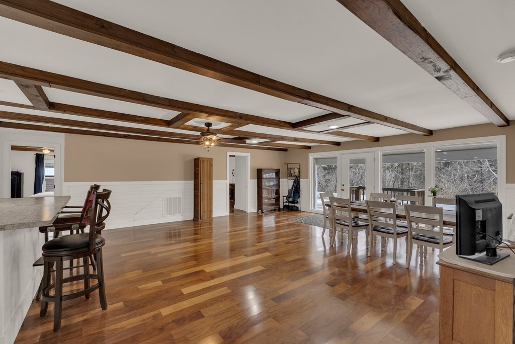 2165 Ben Mason Road Cookeville, TN 38506 - Photo 11 of 52 a dining room with furniture wooden floor clock and a chandelier