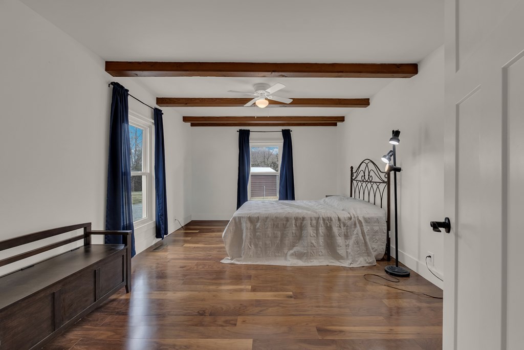 2165 Ben Mason Road Cookeville, TN 38506 - Photo 14 of 52 a view of a hallway with wooden floor and staircase
